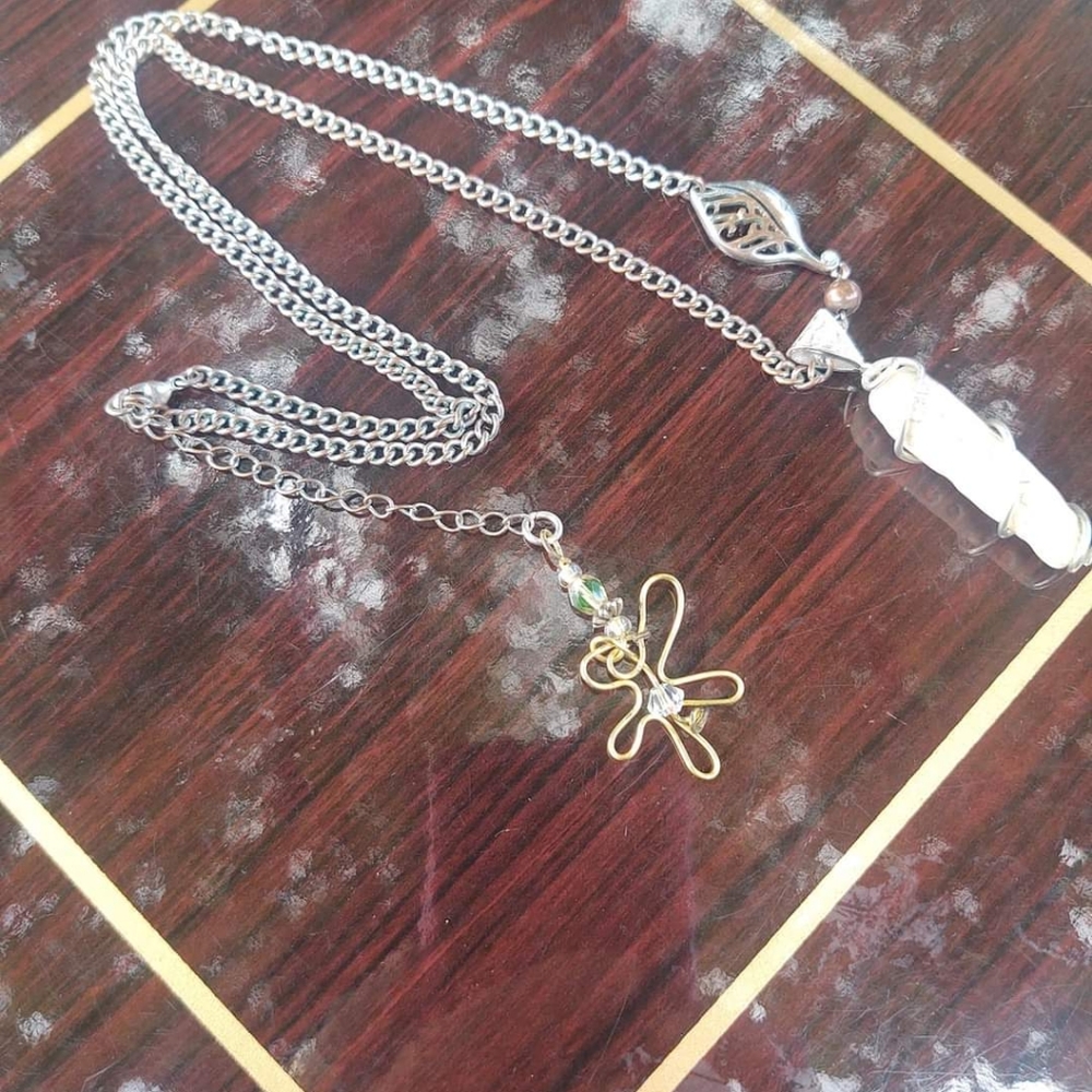 Another handcrafted necklace I made from an ocean shell found in CA. 925 SS
